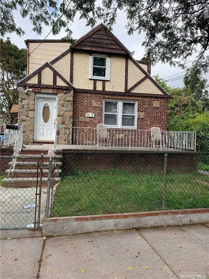 2 family Brick with finished basement and 1 car garage huge back yard