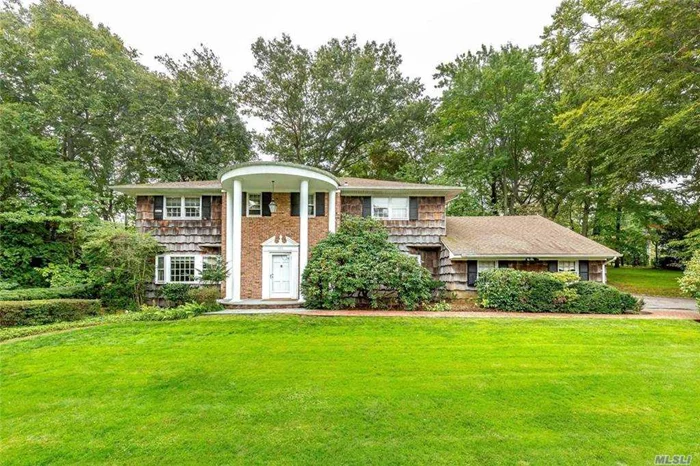 Stately Center-Hall Colonial on approximately half an acre of rolling grounds in the heart of East Hills/Nob Hill. Perfect mid-block location, one of the largest properties in the area. Large Entry Foyer leading to Formal Dining Room, Oversized Living Room, and Family Room with Fireplace. Eat in Kitchen with Granite Countertops plus one Bedroom and one and a half Baths on Main Level. Four Bedrooms and Two Baths upstairs including Master Suite with Bath. Large Bluestone Patio off the Family Room. Village of East Hills. East Hills Park.