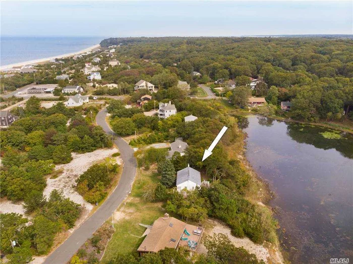 NEW TO THE MARKET. Enjoy Sunrise and sunsets from this waterfront charmer on the Great Pond - Southold&rsquo;s fresh water lake. Go fishing, swimming, kayaking, boating, and even ice-sailing in the winter! LI sound beach just steps away.  Walk for miles on the beach. Renovated, light and bright, large great room, eat-in-kitchen with sliders to the deck and water views of the lake. two bedrooms, bath. Basement for storage.