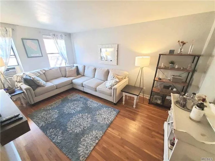 Beautifully Renovated 1 Bedroom unit on second floor! A Spacious Living Room & Bedroom with Lots Of Closets And Windows! Close To Transportation (Buses Q12, Q13, Q27 & Lirr), Shops, Restaurants And Park. No Flip Tax! School District 26. Separate Storage Space Available. Located In Quiet Court Yard Setting. Must See!