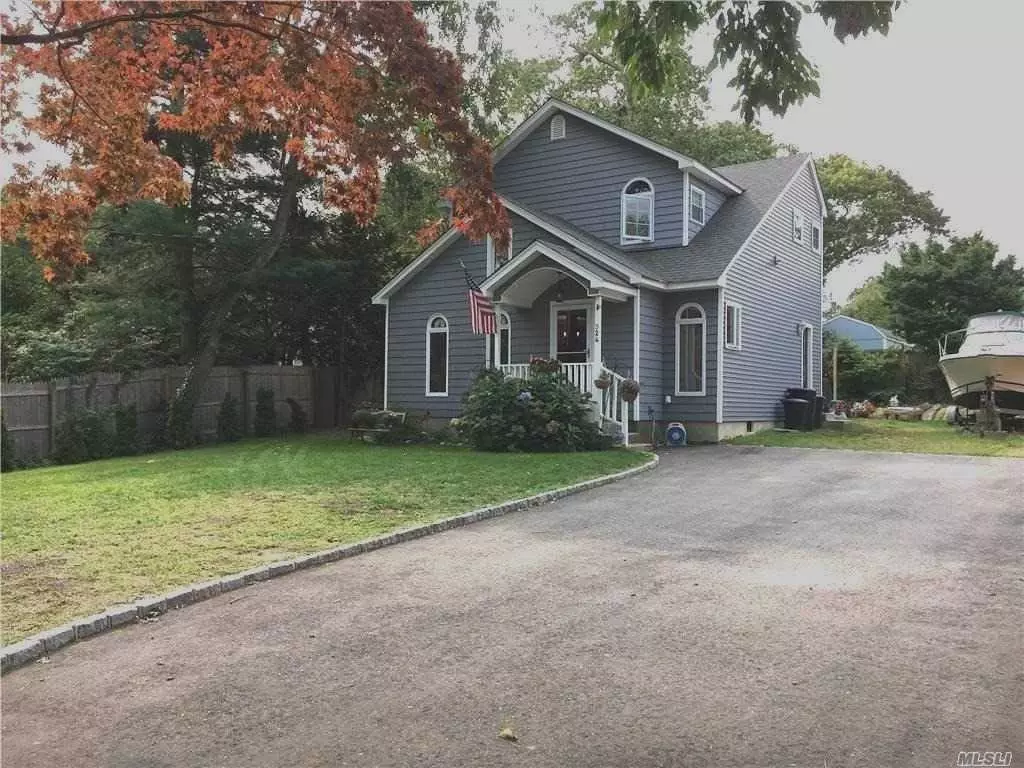 BEAUTY AND THE BEACH!. Leave your car keys home! Short walk to Private Asso. sandy Beach, Dock, Boat ramp, Moorings, Boat racks, Pavilion, Dock, Beach playground. Lifeguards/Float in Season. Totally remodeled in 2017 keeping a few old charm accents like the Claw foot Tub, wide plank Hardwood floors. New Siding, Roof, Plumbing, HVac, Cent. Air, Gas Boiler, Hot water heater, Kitchen, Baths, Patio, Cesspool/septic. Wide, new long driveway to accommodate at least 6 vehicles. Pull down stairs to attic. Perfect year-round or Get-away Beach Living at its Best!! Status: AVAILABLE!!!