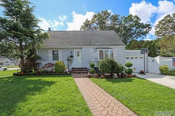 This charming cape is located in the heart of Massapequa Park!  Offering 3 nice sized bedrooms & wood floors on the first floor. Backyard pavers lead to a great entertaining area with room for a pool. Quiet tree-lined street. Close to town and train. Clean, clean, clean!