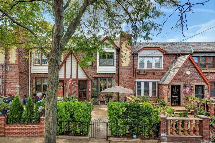 Legal 1 family, Tudor style home in the Maspeth plateau. Parquet floors in the first floor, hardwood floors in the second floor. Working fireplace. Community driveway. 2 car garage, attached. Security system.