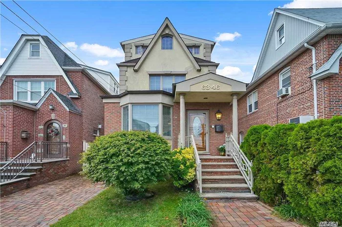 Unique & well appointed 1 family detached home completely renovated from top to bottom. This four level home boasts hardwood flrs & crown moulding through out, FDR, LR w/ fireplace, chef&rsquo;s kitchen w/ hi end appliances, 2 full bths, 2 half bths,  4 bdrms, full fin basement, pvt yard w/ deck & covered awning, pvt drvwy & detch&rsquo;d 1 car garage. The spacious master bedroom on 3rdf fl is connected to a dressing rm & the modern & elegant master bthrm. Additional features include new Anderson windows & doors, a laundry shoot located thru out the home, central vac, 5 heating zones, 2 AC zones. Too much to list!