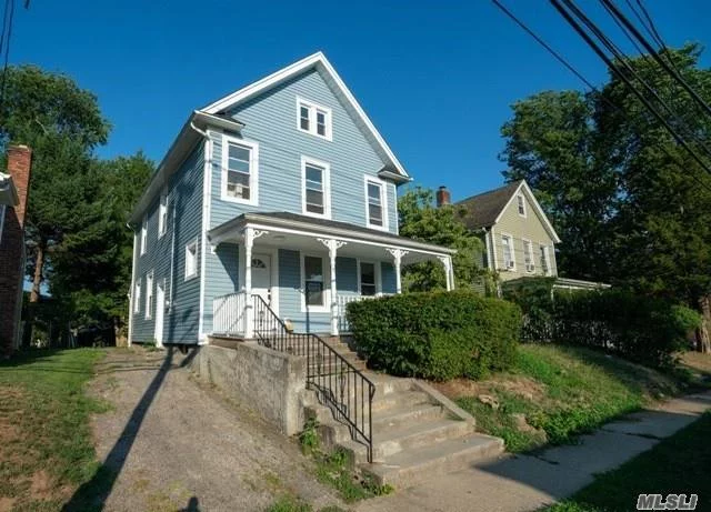 Beautifully restored 3 bedroom Colonial boasting original details with a Modern Design, including a vacant lot.  Only steps away from private beach & Yacht Club. Close to stores & transportation. Home is fully renovated, with modern kitchen and brand new stainless steel appliances, formal dining room with french doors, sunny spacious living room, 3rd floor has potential for 2 add&rsquo;l bedrooms. This home is updated from top to bottom featuring a large secluded backyard with a cozy front porch to enjoy. Extra 5000 sq ft lot.