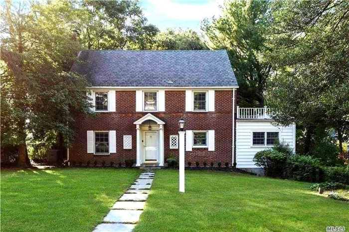 Worthy of your attention! Stunning brick Colonial has been redone, relandscaped and reimagined. Back porch leads to new terrace and lawn and blue stone steps. 4BRs, 2.55 bas. Updated stylishly. Generous room sizes and comfortable spaces. Beacon Hill Association beach & tennis w/membership & dues. Just .9 miles to center of Main Street.