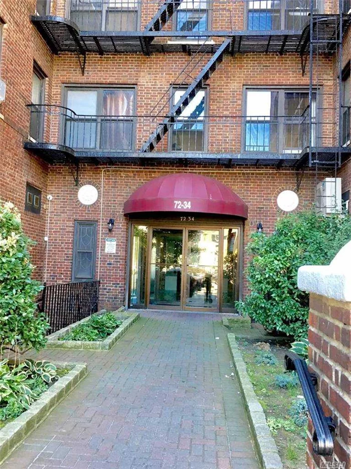 Bright prewar top floor one bedroom condo rental in the heart of Forest Hills. Large open living room/kitchen space, new refrigerator and stove, hardwood floors, high ceilings. Centrally located in the Austin Street shopping and dining area. Close to express subway and buses, LIRR station, major highways.