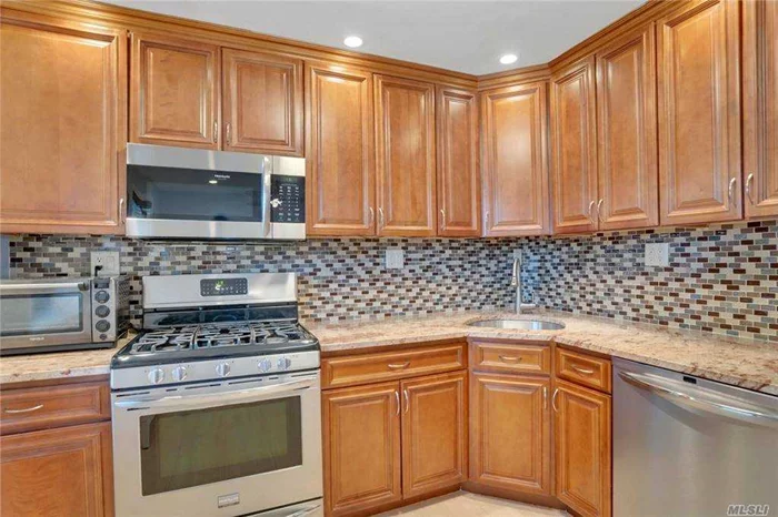 **City Is Too Boring These Days??**Come To Gold Coast North Shore & own this Beautiful Diamond Condition FIRST FLOOR 2 Bedroom+ HUGE BRAND NEW EIK+ Deeded Assigned Parking Spot**All Updated/Renovated in Desired Great Neck Terrace**23 Minutes LIRR To Penn**Gorgeous Bathroom**HUGE Rare Eat In Kitchen with TOP BRAND SS Appliances & Granite Counter Top ** Hardwood Floors** Tile Floors** Beautiful Crown Molding Throughout**Pet Friendly GN Terrace Community Offers Best Private Amenities: Olympic & Kiddie Size ING Pools** New Playground & Basketball Courts** Beach Volleyball**Professional Landscaped Lush Grounds+ Picnic Areas**24 Hours Security**Very Short Distance To City Line Little Neck Train Station, Shopping and Restaurants * A TOP RATED Public School District**Great Neck South Or North School Option Zone**DO NOT MISS THIS ONE***