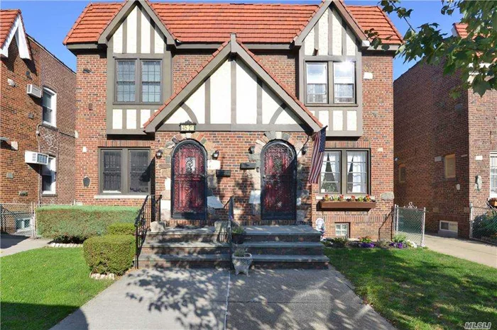 SPARKLING BRICK SEMI-ATTACHED TUDOR IN EXCELLENT CONDITION !!!! SPACIOUS LIVING RM & FORMAL DINING RM.3 BEDROOMS & 1.5 BATH. UPDATED KITCHEN & BATHS + FINISHED BASEMENT WITH FAMILY ROOM & SEP/ENT. 18x43 BUILDING SIZE. LOVELY BLOCK NEAR ALL & WALK TO LIRR !! HURRY DONT WAIT!! THIS IS GREAT ONE ! School Dist#26.