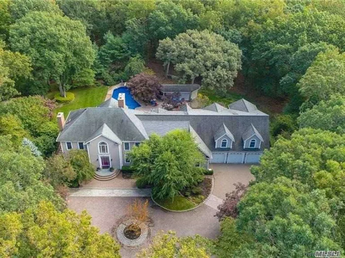 You Can Live Graciously, Work, Entertain & Vacation... That&rsquo;s What This Amazing Colonial Estate w/Full Guest Wing on Private 1.66 Wooded Acres Has To Offer. Two Story Entry & 36&rsquo; High Great Room w/Incredible Millwork, Wall of Windows & FP. Gourmet Kitchen w/SS Appliances & Granite. Huge Prof Style 1st Fl Media/Family Rm w/Radiant Heat & Granite Wet Bar. 1st & 2nd Fl Offices. Gorgeous Limestone & Wood Floors Throughout Main Level. Ceilings 10&rsquo; on 1st fl and 9&rsquo; on 2nd fl Wherever Not Vaulted. MBR Suite has Sitting Rm w/FP, Dressing Rm, Huge Radiant Heated Bath & 2 Walk In Closets. 2nd Ensuite BR w/Updated Bath, Guest Wing w/3 Spacious BRs, Loft & BA. Entertainment Backyard w/Heated Saltwater Pool, Cabana, Outdoor Kitchen/Bar/TV on Gorgeous Patios & Deck. 4 Car Heated Garage w/High Ceilings for Lifts. Close to Beaches, Golf, Parks, Dining & Parkways. Gas on Street Available.TAXES BEING PROF GRIEVED, Estimated $3600 - 7600 + Star Exemption. *Shown By Appt Only*