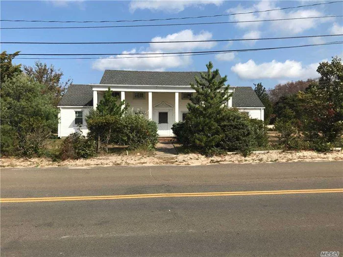 100 yards to Kenney&rsquo;s Beach on LI Sound. Your Greek Revival two story features 4 separate legal apartments and includes (2) 2 BR apartments and (2) Studio apartments. Renovate for $$$$Income or for use as a 1 Family home or B&B. Includes partial water views with room for Pool and Tennis on 1 1/2 acres. Includes separate Lot#54 which is 0.29 acre lot. House is on Lot#53, 1.17 acre.