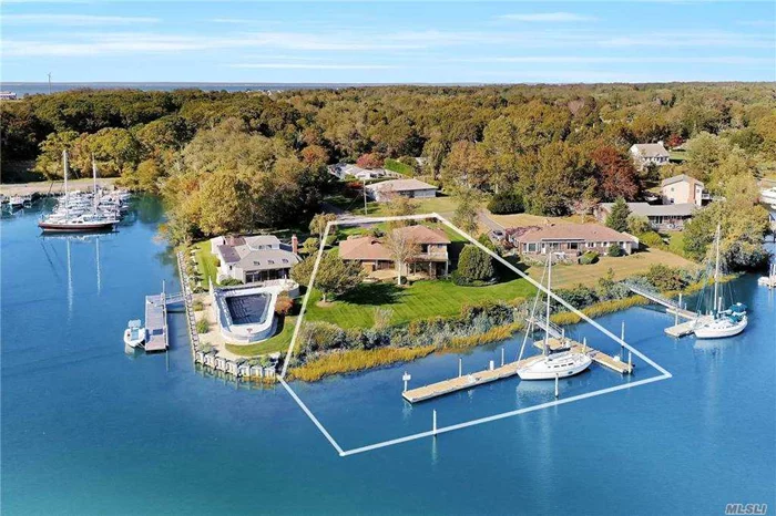 Attention serious boaters! This is the deep water dock space you have been waiting for. Over 150 feet of protected waterfront in beautiful Sterling Harbor. The large dock can easily accommodate oversized vessels. Bike to Sandy Beach and stroll into Greenport Village. Enjoy harbor views from this 4-bedroom, 3-full bath home with wood floors throughout, an open floor plan, central AC, large master suite with walk out balcony. A perfect Greenport location.