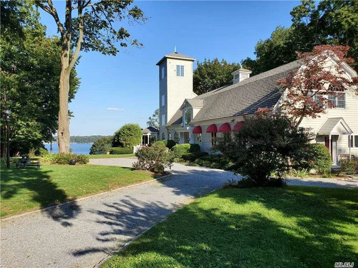 Iconic Waterfront Living: An historic barn masterfully readapted for modern day living, ideally sited at the end of a cul-de-sac, on 1.95 acres of magnificent property to take advantage of the panoramic views of the Long Island Sound. For fortunate homeowners, this is a truly special waterfront refuge with har-tru tennis court with gazebo, rolling lawns, and access to your own, private sandy beach. Elegantly updated, the home has 4 Bedrooms, 3.5 baths and complement of lovely spaces including a chef&rsquo;s kitchen with adjoining den that opens to the back deck overlooking the water. Atop it all, a crow&rsquo;s nest provides the ultimate hideaway and the best views!