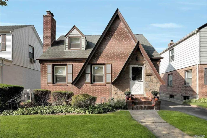 Back on market 4/6/21!! Larger than it looks! Beautifully maintained 4bed/2bath brick Cape conveniently located on quiet tree-lined street near to all- 1/2 block to Cunningham Park, minutes to elementary school, local and express bus to Manhattan & houses of worship! Boasting many updates throughout including large eat in kitchen, gorgeous recently renovated bath on the main level, updated roof, windows. Gleaming hardwood floors throughout main level. Enjoy morning coffee in the sun room overlooking backyard. Long driveway and 1-car detached garage. Large unfinished basement w/great space to finish your way. Great house in prime location- must see! Sold as is