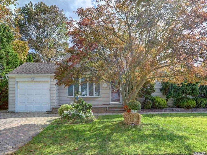 Welcome Home to this Sprawling Split in the Heart of Massapequa Park. This inviting layout is perfect for entertaining! The formal living room leads you into a large, open kitchen area complete with granite peninsula island and plenty of cabinets! Expanded from its original layout, this home boasts a large formal dining room with pass-through to the kitchen. Sliders off the dining room allow for easy access into the expansive backyard, complete with patio area! A large family room and updated full bathroom round out the ground level of this amazing home. Close to Massapequa Park&rsquo;s Park Boulevard with ample shopping, dining and access to transportation. This home has it all! Call it yours today!