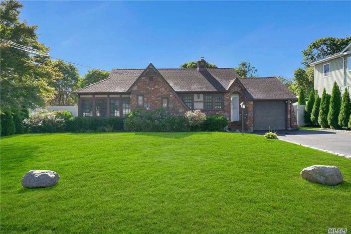 This Tudor-Style Brick Ranch Offers One Level Living And Features 3 Bedrooms, Living Room, Kitchen, Dining Area, Florida Room, CAC, Hardwood Floors, CVac, Skylight, Marvin Windows, Gas Heat, Gas Cooking, Full Basement, Spacious Fenced Back Yard with Patio & IGS All On A 75x125 Lot In A Great Location w/Fast Access To LIRR & Major Roadways & Low Taxes of $7, 655.09 After Star...Come See For Yourself.