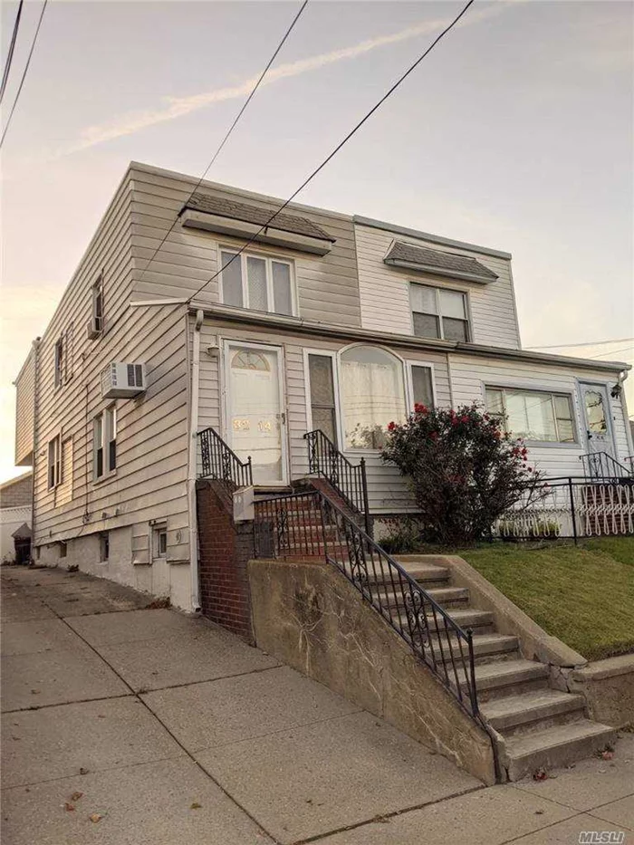 Beautiful Semidetached house located on a quiet block in the prime Bayside area. School District #26! The house is above street level features two -story extension and a detached 2-car garage. Full finished basement. Recently renovated. Move in ready! Close to transportation: LIRR to Manhattan, Buses Q28 to Flushing, Q31 to Jamaica and Q76. Close to shopping and restaurants on Francis Lewis Blvd.