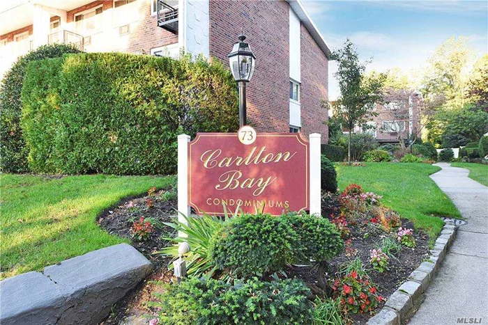 Desirable Port Washington Town House Style Corner unit Condominium nearby all! This spacious, bright and well maintained second level Carlton Bay Condominium duplex offers maintenance free living convenient to Town, recreation and dining. Both levels offer spacious rooms and storage. The first level boasts a Powder room, a renovated kitchen with custom oak shaker cabinetry, granite counters and stainless steel appliances open to the Dining alcove area flowing into a large living room both with hardwood floors and recessed ceiling light fixtures. First level access door to a large private balcony.  The second level is carpeted and offers a king size bedroom as well as a queen size bedroom with Laundry and a full bathroom with a tub and shower. Common Charges include water and heat. This rare find will not last!