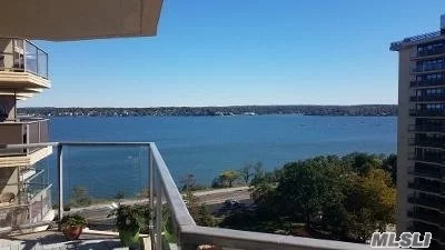 Luxury Building Overlooking LI Sound and Little Bay. Totally Renovated Apartment on12 floor with balcony Many Amenities including pool tennis doorman Ideal location close to all transportation and travel