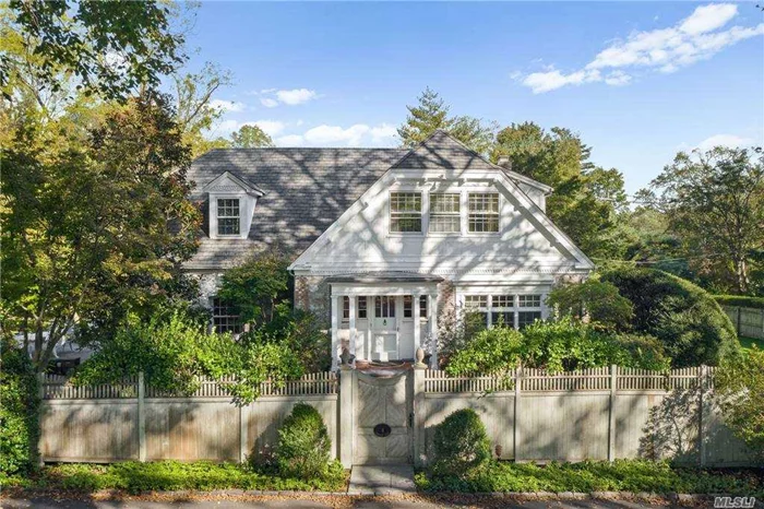 Enter Through The Gates To A Magnificent Carriage House and Guest Cottage With Unique Stone and Brick On 1+ Acre in bucolic Lattingtown. Gracious Center Hall With Walls of Bookcases and Accesses All Rooms. The Den/Family Room Has Bookcases and A Media Area Leading Us Into The Center Island Eat in Kitchen w/ Ample Storage and Updated Appliances. A Formal Staircase Leads To The Second Floor w/ A Beautiful Master Overlooking the Gardens. Excellent for Entertaining and Has Today&rsquo;s Amenities Yet Retains Its Vintage Charm!