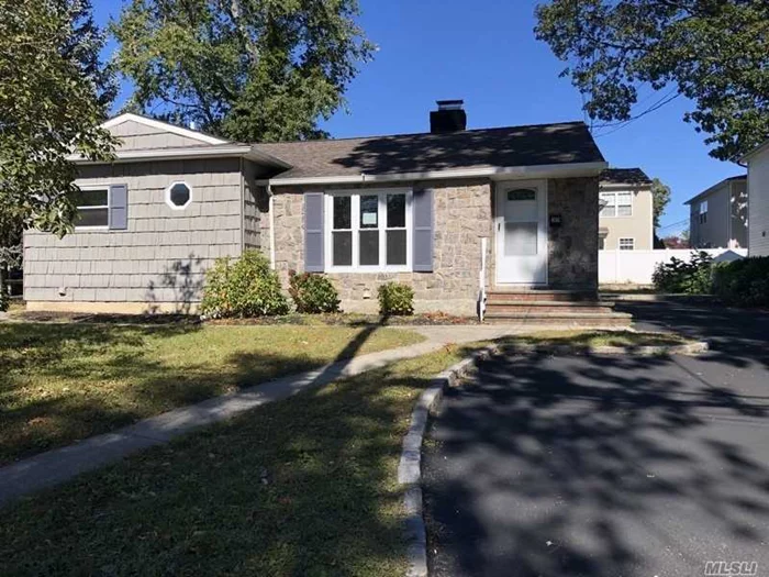 Totally Renovated Ranch in Manhasset Isle - Freshly Painted, New Kitchen w/SS Appliances & Granite Countertops, 3 bedrooms & 2 new baths. New carpet, finished basement, large yard & private driveway. Tenant pays all utilities.