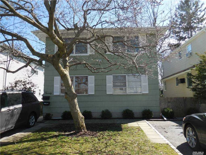 Location! Location! Move Right Into A Fully Renovated 2nd Floor 2 Beds And 1 Bath In Desirable Manhasset Isle Featuring Hardwood Floors Throughout, Stainless Steel Appliances, Balcony, Separate Storage Area with washer/dryer. Driveway For 1 Car. Tenant Pays For Utilities. Available Immediately.