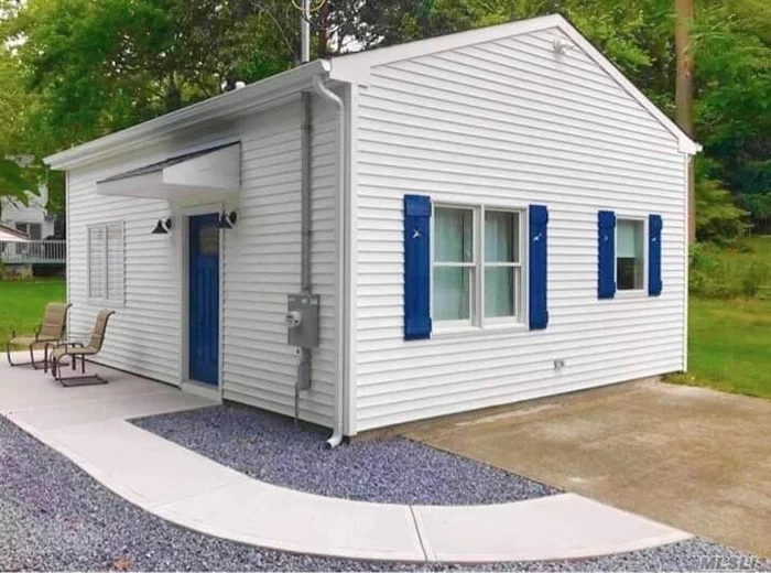 All new contemporary cottage with quartz countertops, all amenities and very private - private patio and green space, , hot water & heat by propane, access to private beach--tenant does snow removal.