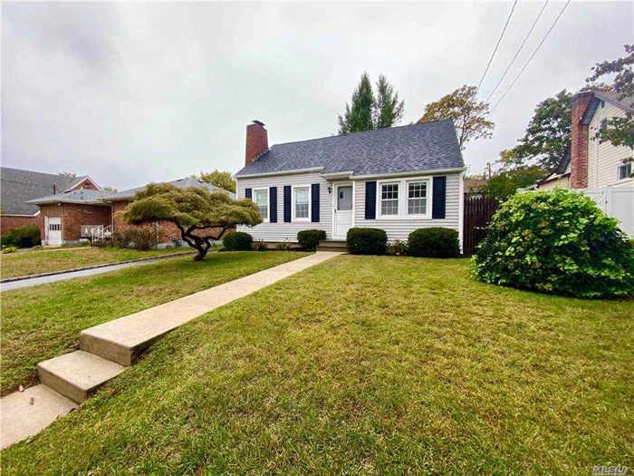 Charming and Renovated... need I say more? Here the living room is the heart of the home with fireplace and easy flow to eat in kitchen. Two bedrooms and full bath on first floor, playroom and third bedroom on the top floor. Finished basement and laundry room. Lovely backyard space, driveway, beach rights, award winning Locust Valley School District. Come see for yourself!