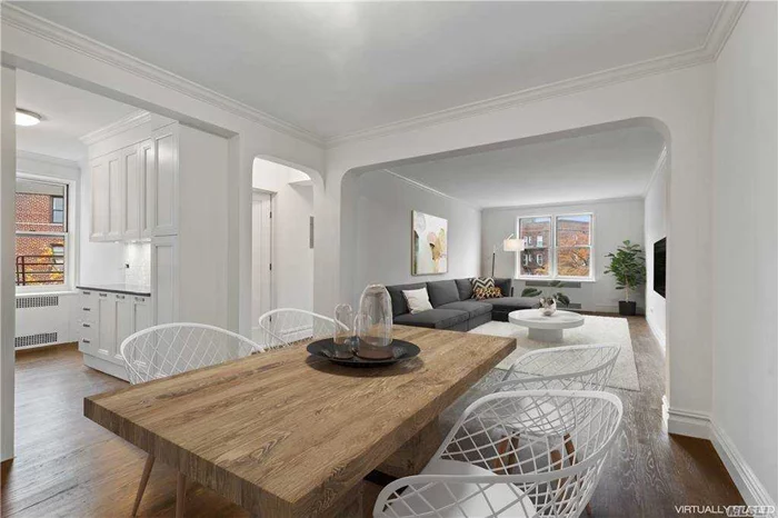 Top floor - top renovations! Custom details throughout. Italian cabinetry, Frigidaire Gallery series, smudgeproof. Cesarstone counter tops, under-cabinet lighting. Prewired for cable. Solid wood floors, brilliant light! Dog friendly. Storage, bike room, gym.