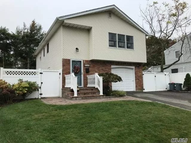 Prime Village location, 5 bedroom, 2 bath Hi-Ranch w/ gorgeous IGP & a legal accessory apartment by permit-separate electric meters, economical gas heat-convenient to shopping, restaurants, schools, parks & the LIRR