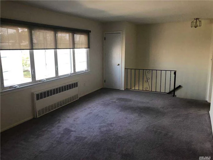 Super Clean 2 Bedroom Apartment. 2nd Floor Of 2 Family Hi-Ranch. Parking In Municipal Lot 1 Block Away. Heat And Water Included.