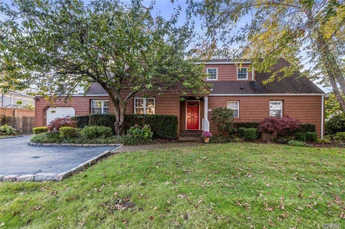 expansive expanded ranch on prestigious street in old woodmere, flr/fpl, fdnr, large eik with breakfast room, spacious den /fpl main flr mbr suite and bth, many closets + 4 additional bdrms all situated on 100x100 beautiful tree lined property, Location! Location!