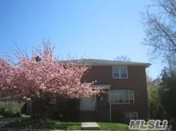 Beautiful sunlit unit on second floor- Hardwood Floors -Updated Bathroom -