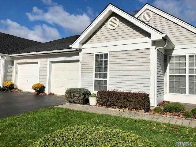 Leisure Glen Beautiful Greenport model-largest of the attached units- with covered parch and extensive patio. Laminate floors, gas fireplace, newer heating system and newer appliances. Nice, private location with lots of beautiful landscaping.