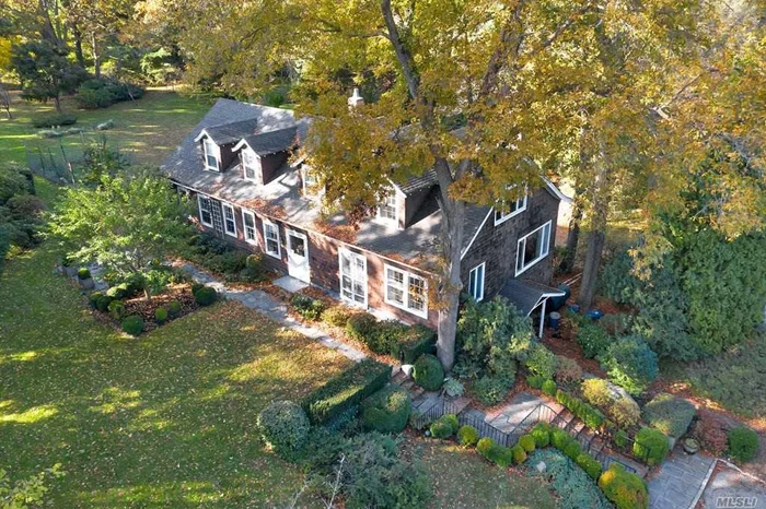 Do Not Miss the Opportunity to own this, ULTRA PRIVATE, Nature Lovers Dream Home! This Charming 6 Bedroom & 4 Bath home was transformed from a Carriage House in 1950. The property is secluded on a double cul-de-sac, in one of the most desired areas of Cold Spring Harbor, surrounded by the Wawapek Preserve, where you can enjoy endless possibilities on your manicured 2.36 acres. Breath-taking Hardwood floors throughout, excellently paired with crafted moldings & high ceilings. Pluses include; propane-gas cooking, upgraded security system, & screened-in porch. Situated on the property is a beautiful original barn with electric and water, Legal accessory apartment & attached 2 car garage. LOW TAXES! Cold Spring Harbor Schools #2.