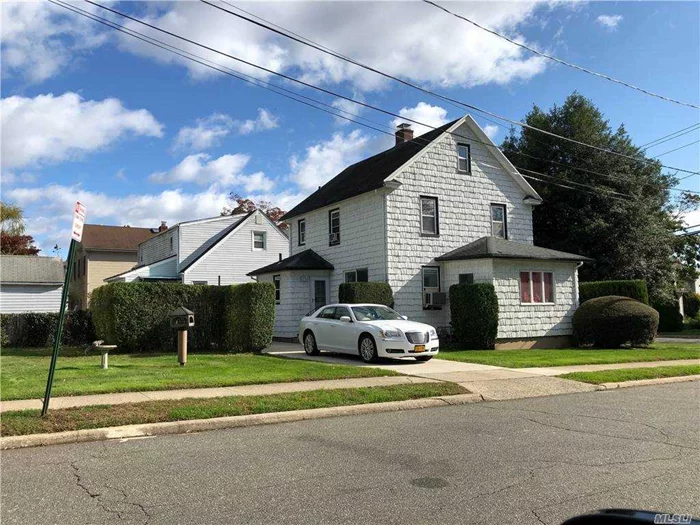Great Location Award Winning Roslyn School 3 Bedroom, 2 Bath Colonial With Walkup Attic Updated Gas Heat And Hot water heater Colonial Sorrounded By New Houses Close to Park , Shopping &LIRR.