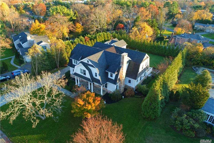 Beautiful Flower Hill Home with open, friendly flow, and multiple green features, custom-built by Old World Quality Construction. Living room, large formal dining room, mudroom, first floor home office, half bath, bright and airy kitchen, and Great room. Perfectly appointed wIndows, skylights, and doors align across the rear of the home with an abundance of natural southern exposure sunlight. Upstairs are four bedrooms all en-suite, Master Suite includes additional sitting room, walk-in closet and a luxurious spa like master bath. Lower level with extraordinary space including a guest ensuite, a rec room, gym, home office, half bath, and media room with french doors opening to beautiful patio. Two car garage with lower storage level adjacent to your own turf backyard completes this half acre masterpiece!