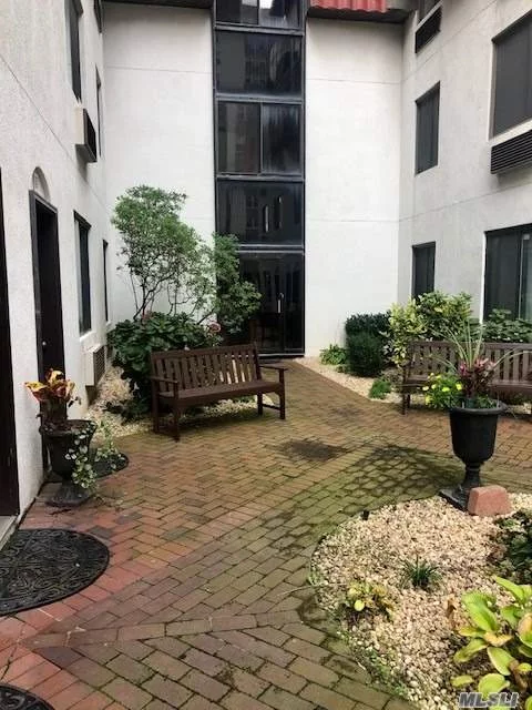 Unique find! 1st floor 3 Bedroom unit in courtyard gated building. Private designated parking spot included. Unit is move in ready and steps from boardwalk and beach. Walking distance to shops and LIRR.