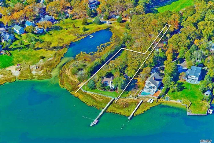 Set on an acre at the end of a quiet private road, this +-2430 sq ft waterfront home offers incomparable water views to the South Fork. Perfect for outdoor living, with 100+/- bulkheaded feet on the bay, a dock and decks on both levels. Originally built in 1905, the 4 bedroom, 2 bath home has high ceilings, water views from all the main rooms, wood burning stoves in the living room and main bedroom, an open eat-in kitchen and plenty of space to work from home. Bring your architect and plan the next incarnation of this North Fork classic. Close to a marina, world-class golf courses and the renowned wineries and farms of the North Fork. Two adjacent vacant lots also available; acquire all and create your waterfront compound.