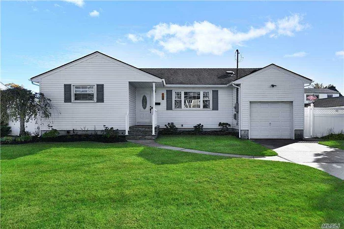 Welcome home to this gorgeous property located in West Babylon, NY. As you first pull up to the home you witness an immaculately landscaped yard and captivating facade that radiates excellent curb appeal. When you enter, the living room greets you with gleaming wood floors, a cozy living Room a delightful ceiling fan, and large windows. The wonderful wood flooring carries throughout the main living areas of the home. The Formal dining room is just off from the kitchen and features plenty of space for almost any sized group and is well lit with natural lighting. The kitchen comes equipped with gorgeous granite-style counters, catching tile backsplash, recessed lighting where it is needed, modern appliances, and a plethora of storage with tons of cabinetry throughout. Just off to the side of the kitchen and occupying the same space is a breakfast nook area for a quick bite to eat and access to the backyard deck & Pool.