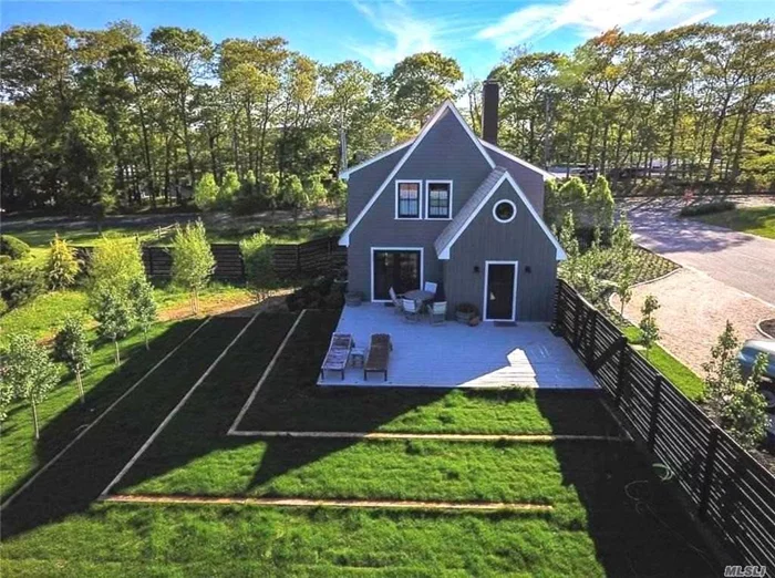 An iconic 1930s North Fork farmhouse totally renovated in 2018 with new cedar roof, Boral siding, new copper gutters, Anderson windows and French doors, new kitchen w/ appliances and wood block countertop, master bath en suite with hex black marble and mahogany trim waterfall shower, half-moon pebble driveway, and a half-acre backyard fenced with designer Shou Sugi Ban burnt cedar horizontal planking. Landscape planted with 125 trees including a peach & pear orchard, Himalayan birch forest, blueberry warren, screening hedge trees on all sides, and a wildflower meadow, all covered by new WiFi controlled in-ground irrigation system. Bright and sunny, 3 bedroom, 2.5 bath, gas fireplace, fully finished basement with oak floors and Finnish sauna. Garage, Room For Pool. Conveniently located walking distance from Love Lane&rsquo;s shops and restaurants and LIRR station. Across the street from Strong&rsquo;s Marina with boat launch and two miles to gorgeous Bailie Beach.