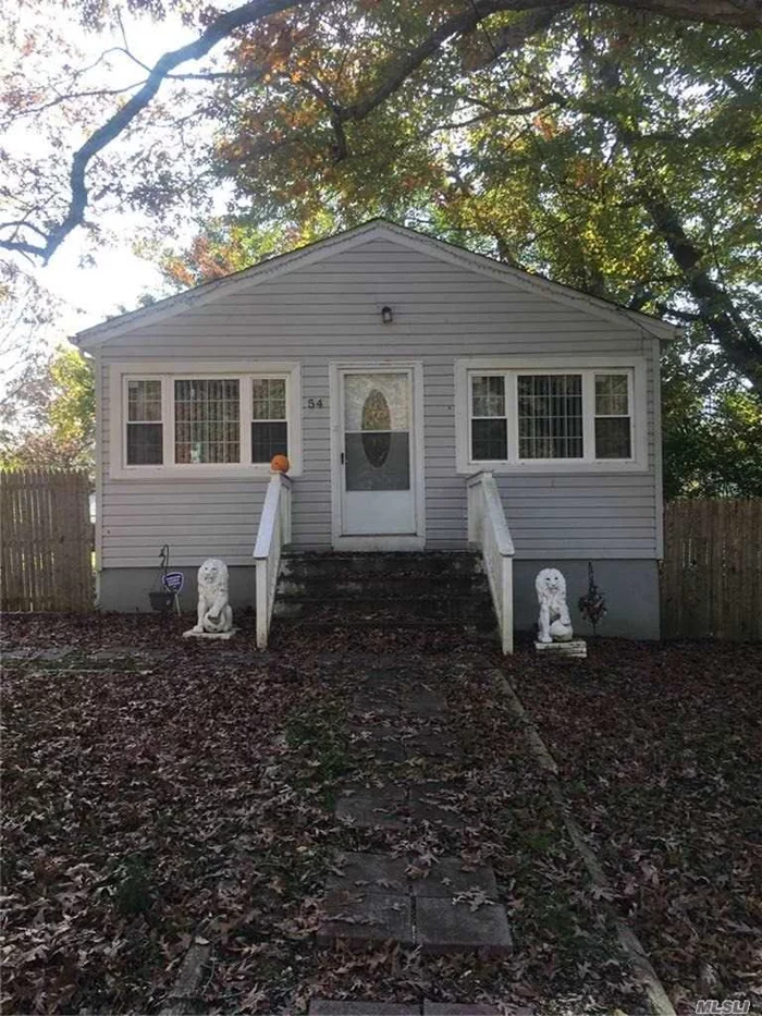 3 Bedrooms, 1 full bath, some updates, roof is 5 years old, large yard, some fencing, wood floors.  W/D hookups in house. Brand New Boiler. These house is adorable. Turn-key