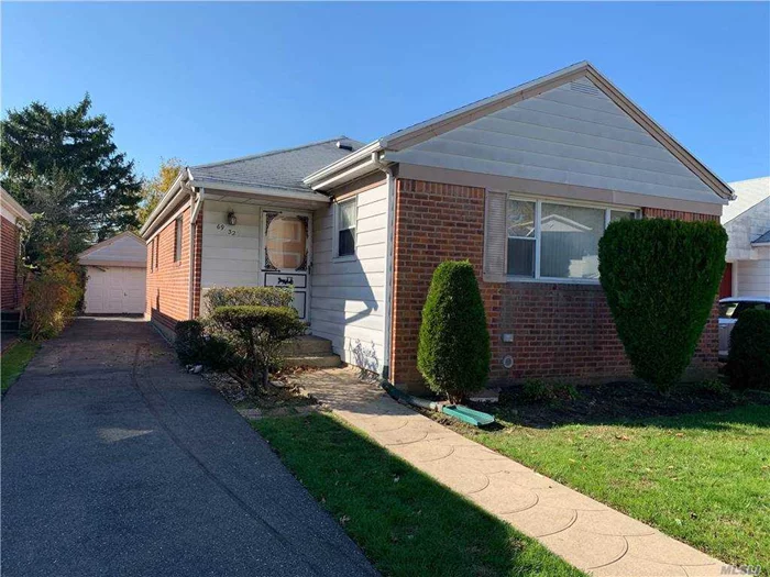 Spacious Brick Ranch on quiet street. Near shops, park, transportation,  School District #26.  * R3X Zoning Priced to sell!!!