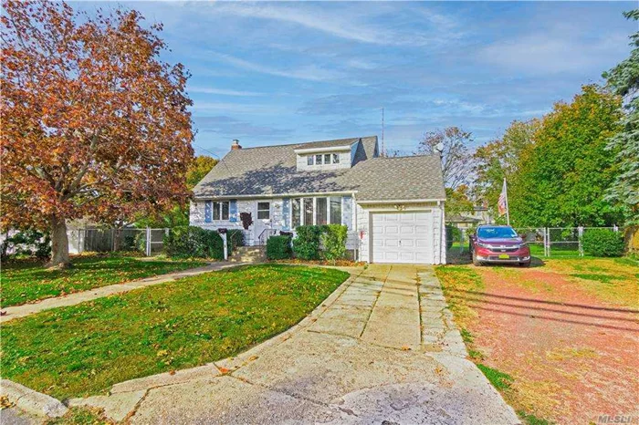 Great Cape In Conlu Park Section Of East Islip! In Need Of Some TLC But Has Great Bones! Newer Electric, Heating System & Roof. Oversized Flat Backyard. Full Finished Basement & Garage. Close To Major Highways & Shopping!