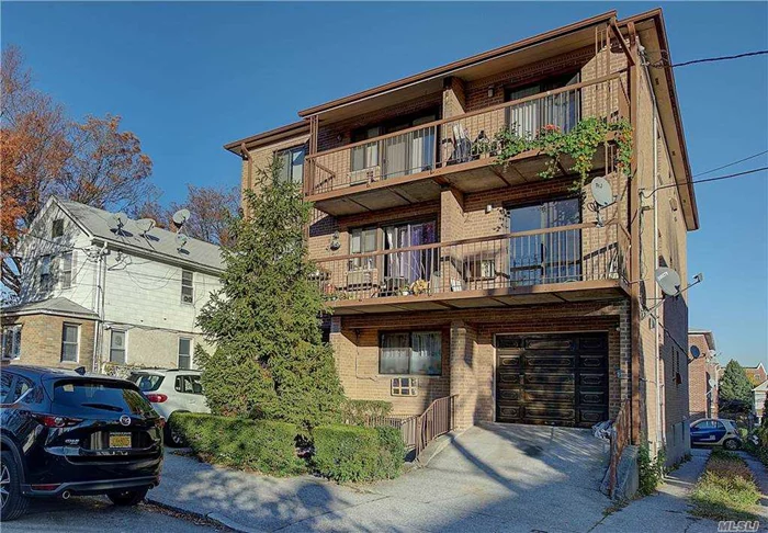 Bright and Very Spacious 1 Bedroom Apartment with Large Windows, Sliding Doors to Front and Rear Balconies, Beautiful Hardwood Floors Through Out. Laundry in Building. This Second Floor Unit is Conveniently located near Shopping, Highway and Public Transportation (Q17, Q88). Very Low Common Charges includes Water, Maintenance, Garbage Removal, Landscaping, Cleaning and Snow Removal