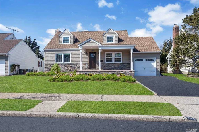 99% New construction, expanded Cape with open floor plan, kitchen with large island, sliders to paved patio, beautiful private yard, Ductless heat/air, hardwood floors throughout, fully finished basement. East Meadow schools.