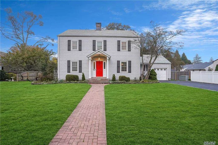 All the charm of a classic colonial, this beautiful home sits on a VERY quiet street in the Historic District south of Montauk Highway. Walk to docks, bike to the beach, nature center and downtown Islip. The large formal living room with fireplace has French doors leading to a peaceful screened in porch and an outside deck for entertaining. Master bedroom upstairs with 2 walk in closets, 2 additional bedrooms upstairs and 1 downstairs. wood floors throughout this cozy home. Stairs to third floor attic with lots of space. This home will not last!