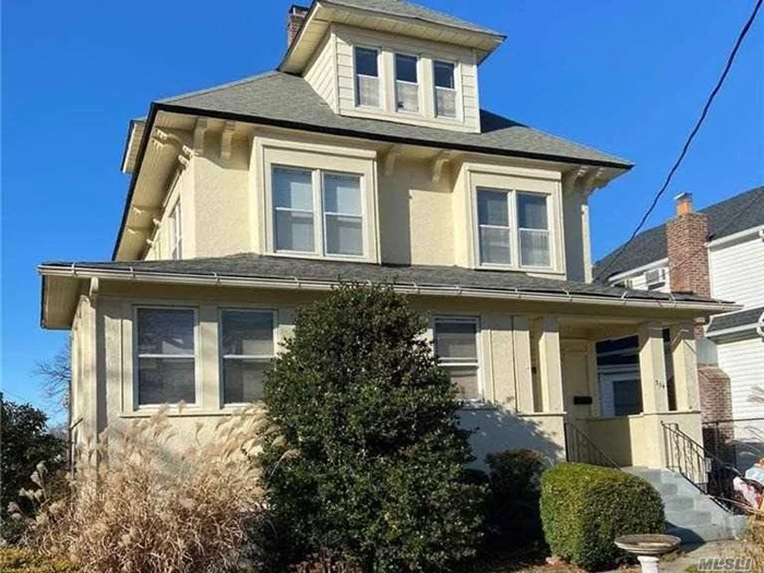 4 level colonial with endless potential on oversized lot in Cedarhurst with low taxes. House needs TLC. Attic bathroom not functional, unfinished basement.