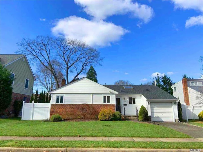 Great School Dist. 60x100 big lot, Range style for future development. New Finished Basement, New Update Kitchen, New gas Heating system, New Roof. Quiet neighborhood, close to shopping, expressway, formal Dining Rm, and spacious living room, sunroom, full finished basement with family room, office room, full bath,  lots storage.