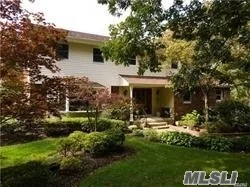 MAGNIFICENT DEAL!!!!! Amazing Center Hall Colonial with many updates and Commack Schools, Features Family Room with fireplace and sliders to private patio, lower level just completing with Stunning custom bathroom, bedroom, Entertaining Bar area entering into a private theater room, this is stunning.....Master suite with master bath, oversized bathrooms custom done.... New heating, Lifetime roof, any many more extras...